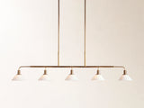 Theron 60" Linear Chandelier with Milk Glass in Brass
