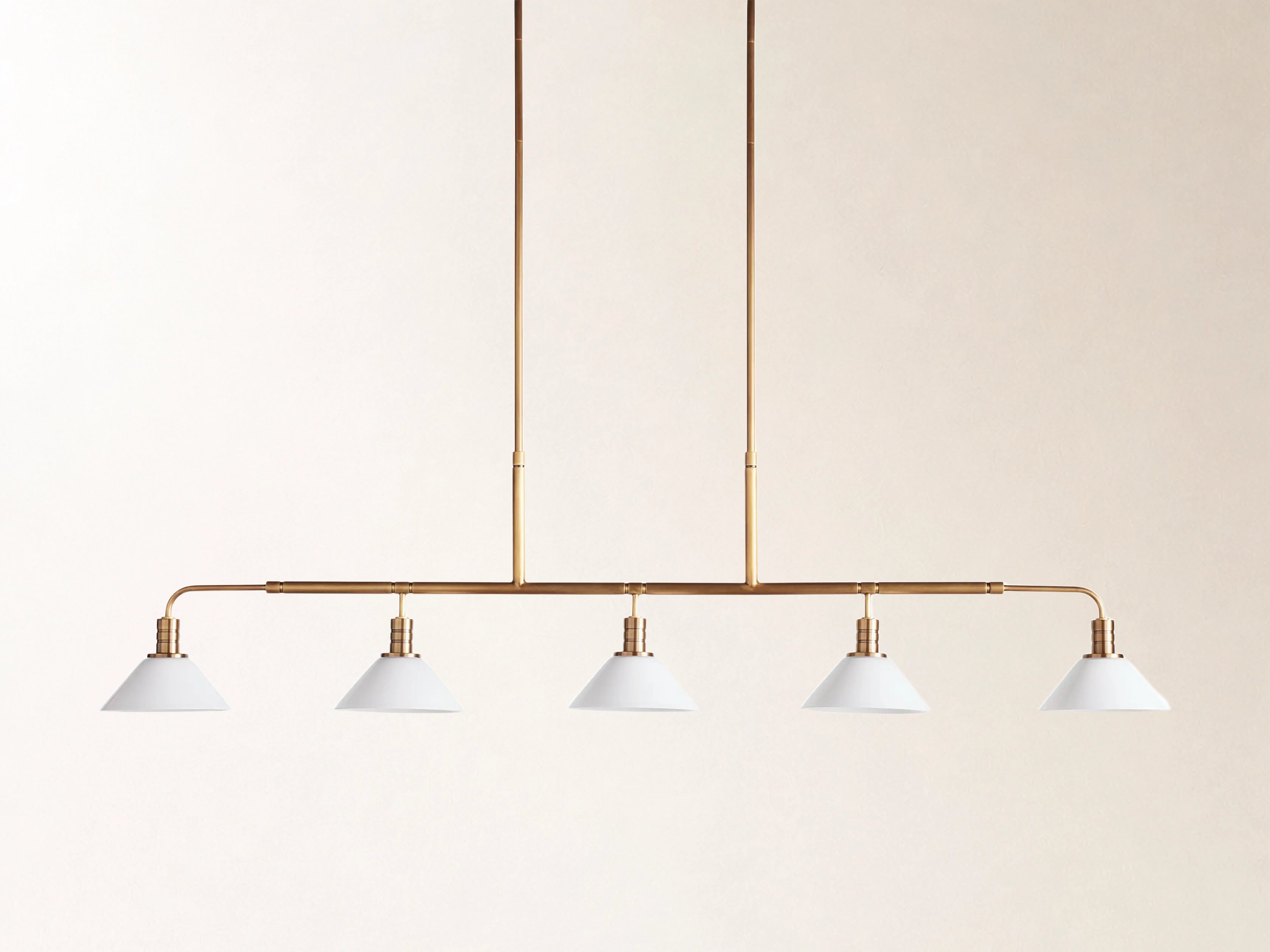 Theron 60" Linear Chandelier with Milk Glass in Brass Secondary image